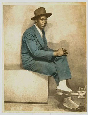 Not all photo restorations have to be heroic efforts. The restoration of this dapper gentleman's 1945 portrait note the spats he's wearing only required stain removal and color correction. Total restoration time was about 2 hours.